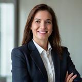 Portrait of Sarah Jenkins, Head of Operations at SwiftBox Logistics, a focused and experienced woman.